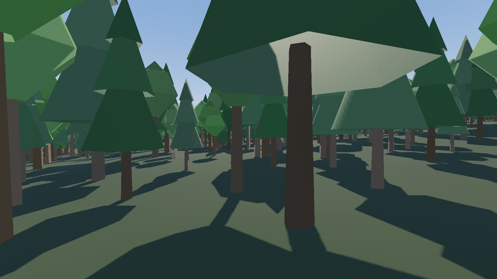 A forest track through Almindingen, pines and broadleaf close on both sides.